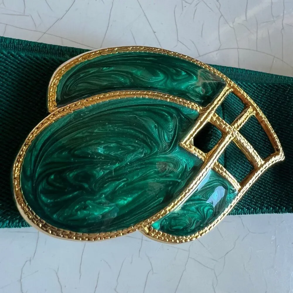 Day-lor usa Vintage elastic belt features a distinctive two-piece green enamel a